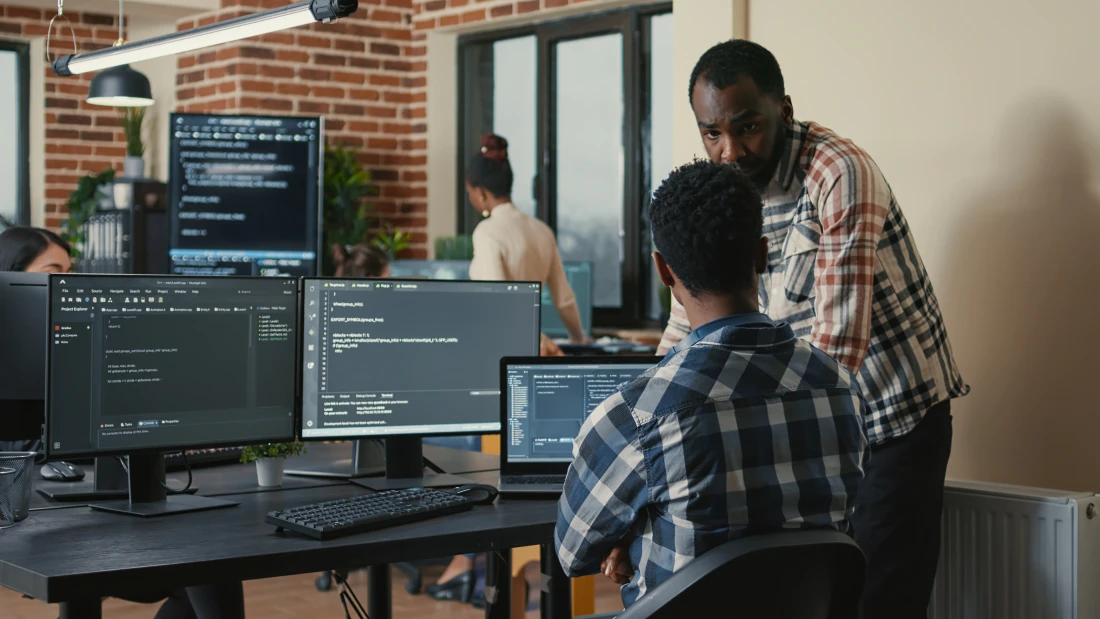 Developers working together on technology solutions